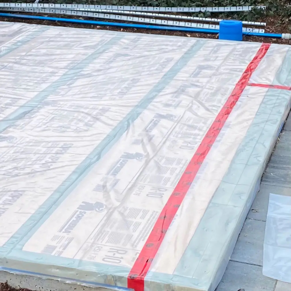 Cover with plastic vapor barrier (optional) and begin to assemble your structure